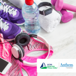fitness equipment including tennis shoes, a water bottle, fitness tracker, hand weights and headphones